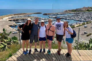 Fit Club York members on a coastal walking and wellness trip overlooking a marina