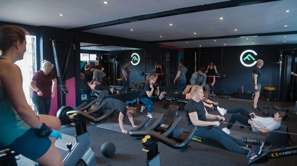 Members training during a group personal training session at Fit Club York gym
