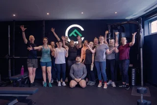 Fit Club York members and coach during a group training session inside the gym in York