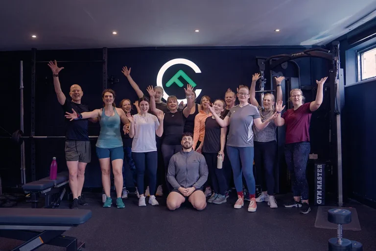 Fit Club York members and coach during a group training session inside the gym in York