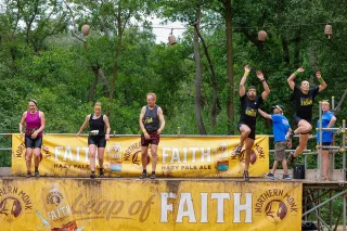 Fit Club York members completing a Total Warrior obstacle course challenge